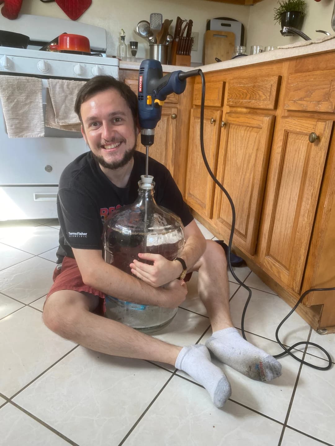 We clean our fermentors using a specialized drill bit......